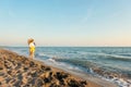 Love couple walking on the sand beach