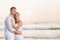 Happy Romantic Young Couple Enjoying Beautiful Sunset on the Beach Royalty Free Stock Photo