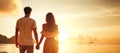 Happy Romantic Young Couple Enjoying Beautiful Sunset Walk on the Beach. Travel Vacation Lifestyle Royalty Free Stock Photo