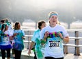 Happy runner during the south bend indiana color run 5k race Royalty Free Stock Photo