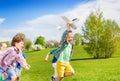 Happy running kids with white airplane toy