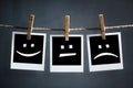 Happy, sad and neutral emoticons on instant print photographs