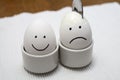 Happy and Sad Smiley Eggs Royalty Free Stock Photo