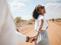 Happy, safari and couple love holding hands on a romantic honeymoon holiday vacation outdoors in summer. Romance Royalty Free Stock Photo