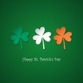 Happy Saint Patrick`s Day greeting card with lucky clovers in colors of the irish national flag. Royalty Free Stock Photo
