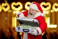 Happy Santa Claus on blurred background. Royalty Free Stock Photo