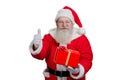 Happy Santa Claus giving thumb up. Royalty Free Stock Photo