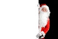 Happy Santa Claus holding blank advertisement banner background with copy space. Smiling Santa Claus pointing in white blank sign Royalty Free Stock Photo