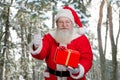 Happy Santa Claus on nature background. Royalty Free Stock Photo