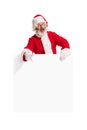 Happy Santa Claus pointing on blank advertisement banner background with copy space. Smiling Santa Claus pointing in Royalty Free Stock Photo