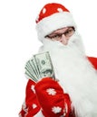 Happy Santa Claus in red hat with dollar money Royalty Free Stock Photo