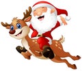Happy Santa claus riding a reindeer