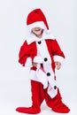 Happy santa helper trying on very large christmas costume