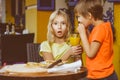 Happy or satisfied boy width girl eating pizza and Royalty Free Stock Photo