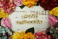 Happy Saturday alphabet letter with colorful flowers border frame on wooden background Royalty Free Stock Photo