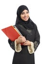 Happy saudi Arab student holding folders