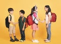 Happy school children handshaking together Royalty Free Stock Photo