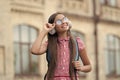 happy school girl listen music in headphones. school girl listen music outdoor. Royalty Free Stock Photo