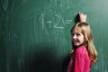 Happy school girl on math classes Royalty Free Stock Photo