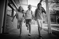 Happy school kids running in corridor Royalty Free Stock Photo