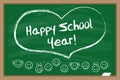 Happy school year. Chalk drawn heart. Inscription on the green blackboard. Royalty Free Stock Photo