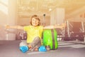 Happy schoolboy with hands like wings at airport Royalty Free Stock Photo