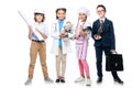 happy schoolchildren in costumes of different professions