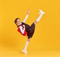 Happy schoolgirl with backpack rushing to school Royalty Free Stock Photo