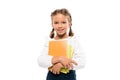 happy schoolkid holding books isolated on white .