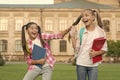 Happy schoolmates. School camp. Modern education. Teens with backpacks. Girls school background. STEM summer camps and
