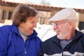 Happy Senior Adult Couple Bundled Up Outdoors