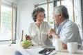Happy Senior adult couple eating healthy salad together Royalty Free Stock Photo