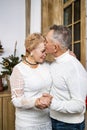 Elderly couple in love. Elderly husband and wife hugging and bonding with real emotions Royalty Free Stock Photo