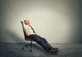 Happy senior business man relaxing in empty office Royalty Free Stock Photo