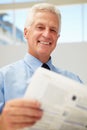 Happy senior businessman reading document Royalty Free Stock Photo