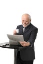 Happy senior businessman reading newspaper Royalty Free Stock Photo