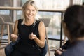 Happy senior businesswoman talking coworkers on team meeting Royalty Free Stock Photo