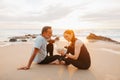 Happy senior caucasian lady and man in sportswear take break with bottle of water, enjoy training and sports app Royalty Free Stock Photo