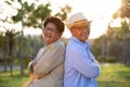 A happy senior couple asian old man and woman smiling and laughing in the garden, happy marriage. Senior healthcare and