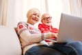 Senior couple using laptop Royalty Free Stock Photo