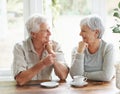 Happy senior couple, coffee and smile for morning breakfast, relationship or bonding together at home. Elderly man and Royalty Free Stock Photo