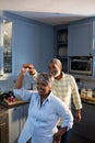 Happy senior couple dancing at home Royalty Free Stock Photo