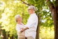 Happy senior couple dancing at summer park Royalty Free Stock Photo