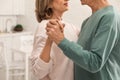 Happy senior couple dancing together at home Royalty Free Stock Photo