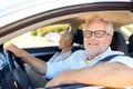 Happy senior couple driving in car Royalty Free Stock Photo