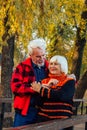 Happy senior couple enjoying each other in the park. Support and care from a loved one, warm emotions Royalty Free Stock Photo