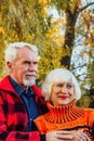Happy senior couple enjoying each other in the park. Support and care from a loved one, warm emotions Royalty Free Stock Photo