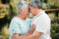 Happy senior couple, face touch and hug in park, garden and peace of care, happiness and love together. Elderly man Royalty Free Stock Photo