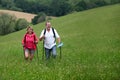 Happy senior couple hiking in countryside Royalty Free Stock Photo