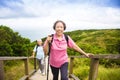 Happy senior couple hiking on the mountain Royalty Free Stock Photo